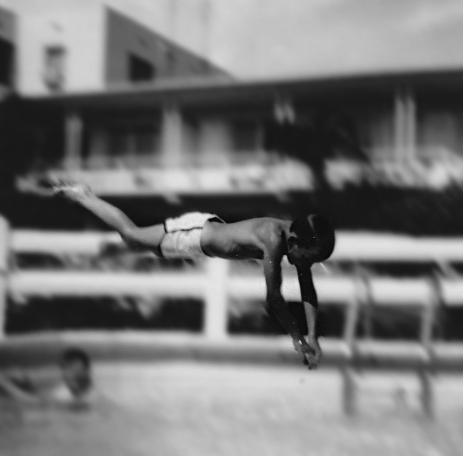 The author dives into a Florida motel pool