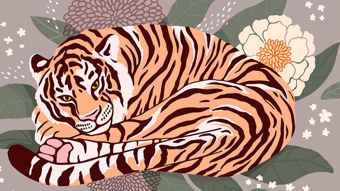 the tiger lies curled up among the leaves and flowers. beautiful Tiger sleeps in flowers